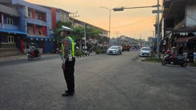Satlantas Polres Melawi Kawal dan Amankan Pawai HUT ke-77 Paroki Santa Maria Nanga Pinoh
